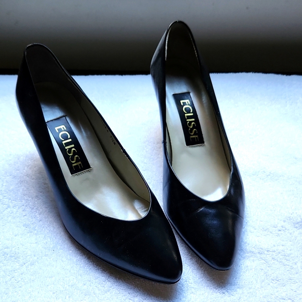 NEW.  BLACK LEATHER SPIKE HEELS.   SIZE 7 1/2 MEDIUM
